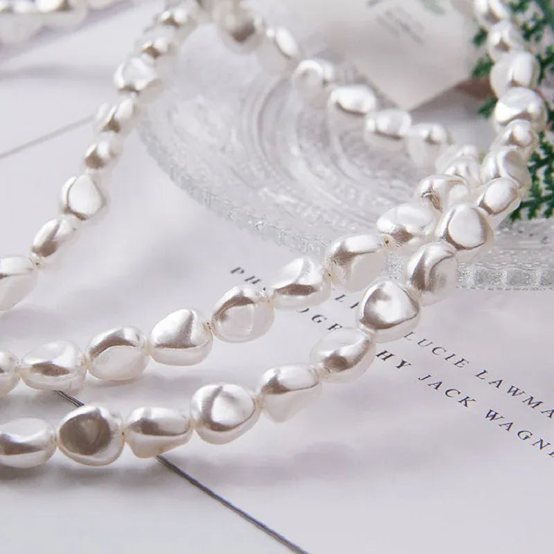 Coque iPhone bandoulière perles transparente